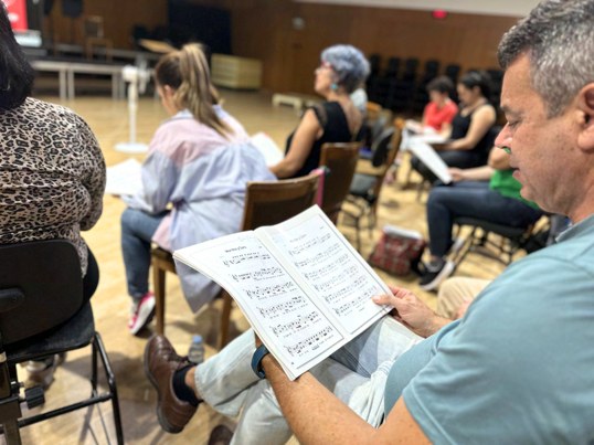Teachers at an Opera Kids masterclass, working from scores